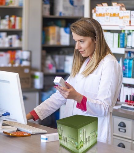 Bedruckte Kartonwürfel in der Apotheke Bedruckte Kartonwürfel in der Apotheke