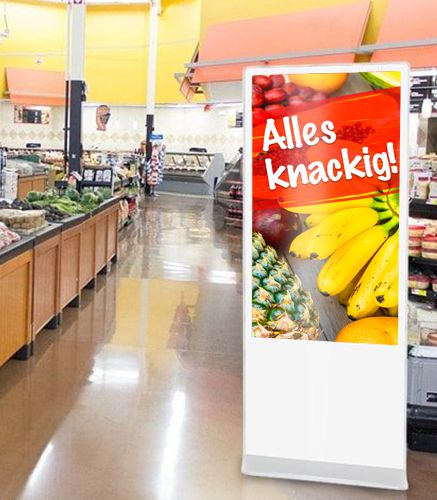 Digital-Signage-Stele mit Touchfunktion - am POS in einem Supermarkt Umweltfreundliche Motivwechsel – langfristige Werbeplanung mit Digital Signage-Systemen